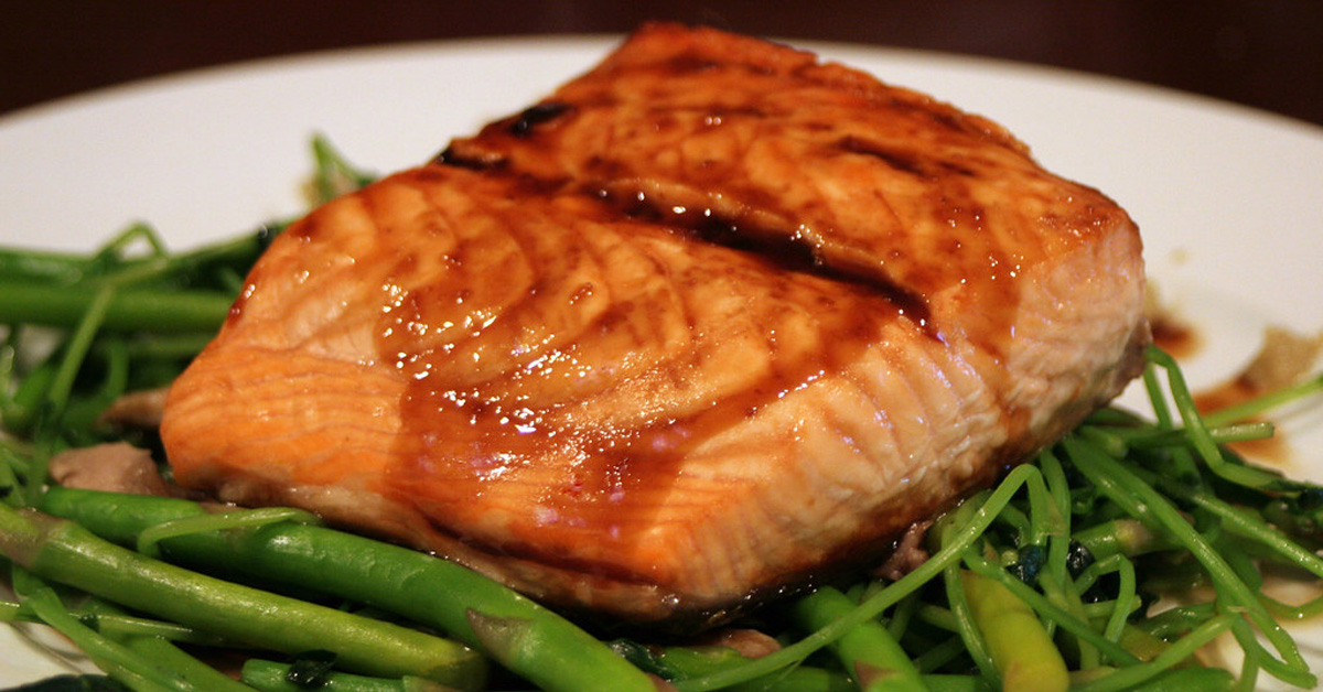 salmon with with sauce on it